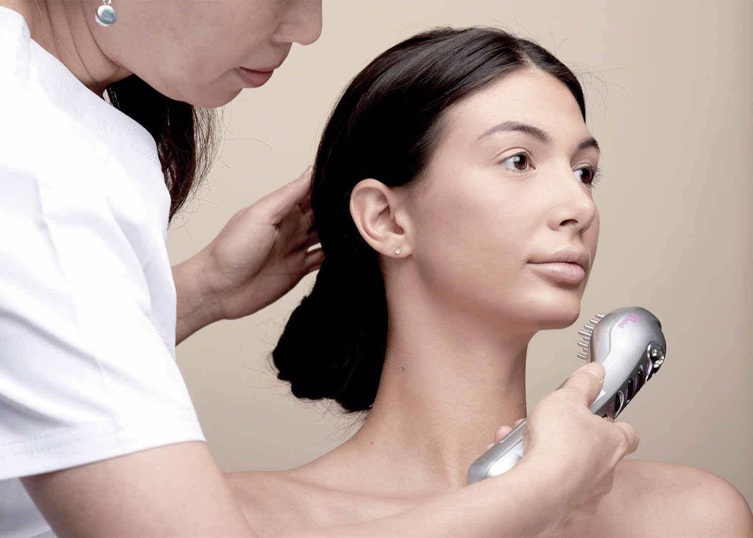 Image of a woman receiving the Luxe-Skin Anti-Aging rejuvenation facial, featuring the unique Luxe Anti-Aging device, highlighting the treatment's innovative technology for youthful, radiant skin.